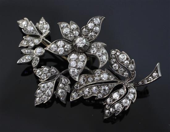 A Victorian gold, silver and diamond trembleuse floral spray brooch, 2.5in.
